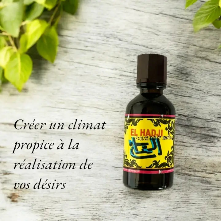 Le slogan "Créer un climat propice à la réalisation de vos désirs" écrit à côté d'une bouteille du parfum El Hadji