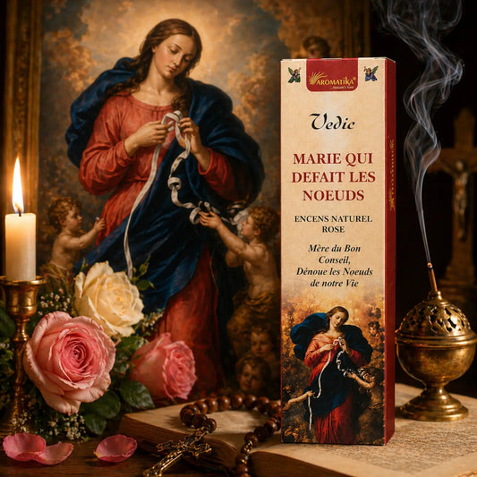 Encens Marie qui défait les nœuds posé sur une bible avec un tableau de Marie en arrière plan