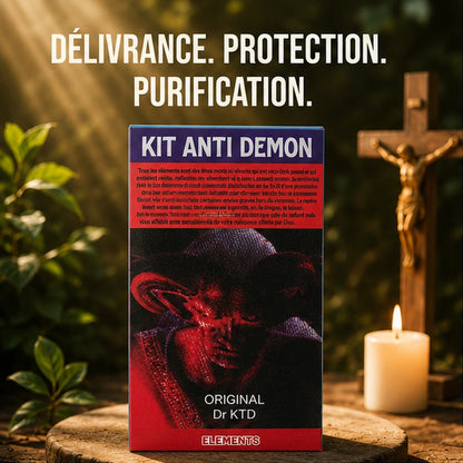 Boîte Kit Anti Démon posée dans une ambiance lumineuse avec bougie, croix et slogan de délivrance.