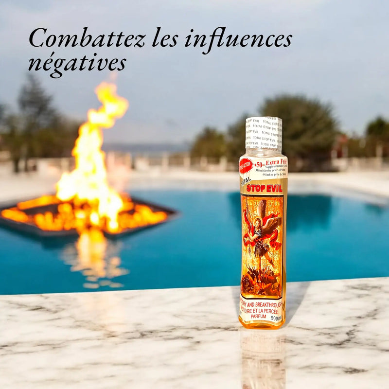 Une bouteille de parfum Stop Evil devant une piscine avec un feu en son centre. Le slogan "Combattez les influences négatives" est écrit sur la photo.