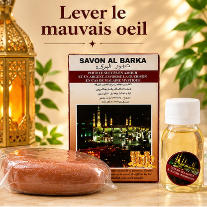 Kit Savon Al Baraka avec essence Rouboutou, présenté dans une ambiance lumineuse pour lever le mauvais œil